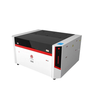 Front view of CO2 laser cutting machine with dual-platform design, red-light positioning, and enclosed guide rail system for precise and efficient metal and non-metal cutting