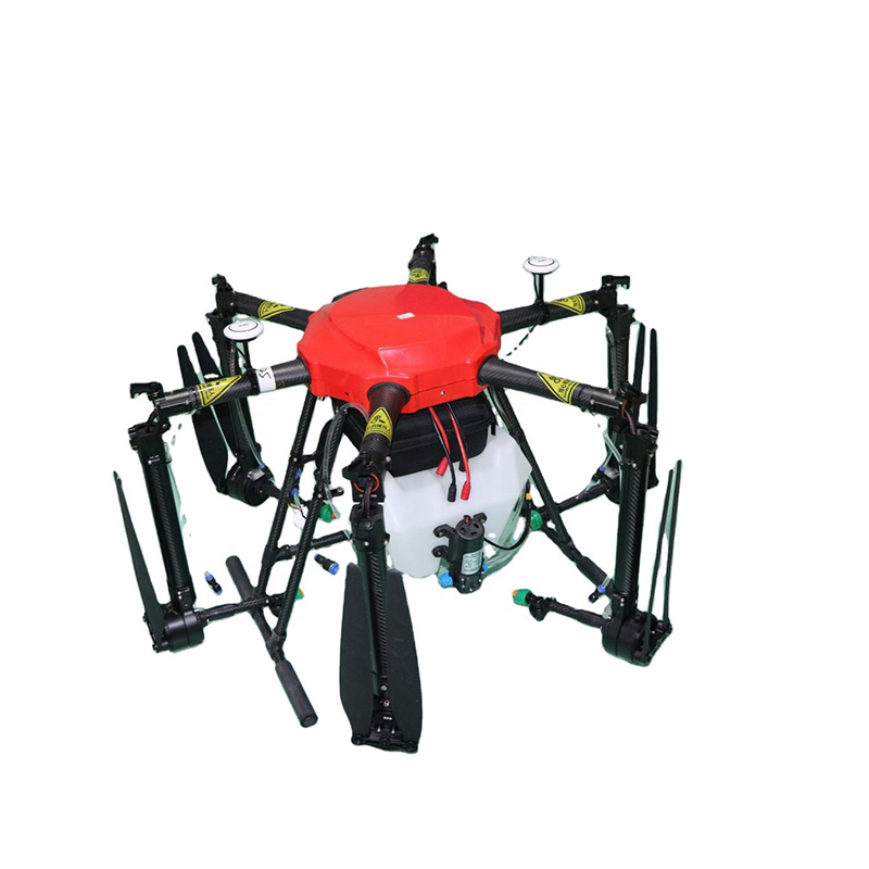 Agricultural drone sprayer with carbon fiber frame and six nozzles for efficient crop spraying and safe pesticide application.