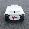 Side view of autonomous UGV-8 delivery robot platform showing modular body and wheel hub motors