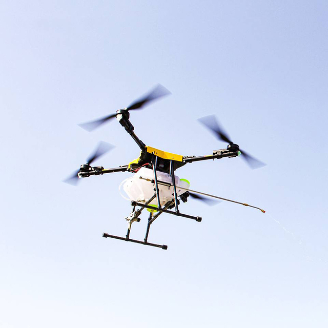 UAV cleaning high-rise glass wall with pressurized spray