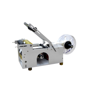 Semi-auto round bottle labeling machine with compact portable design for adhesive sticker application on cylindrical bottles.