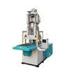 Hybrid vertical injection press with servo drive for plastic insert production