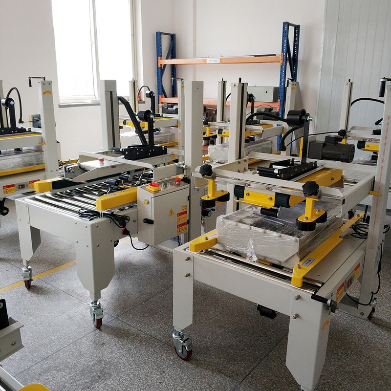 Semi-automatic box taping machine suitable for logistics and warehouses
