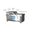 Industrial vacuum packaging machine with dual chambers for meat, seafood, grains, and chemical products.