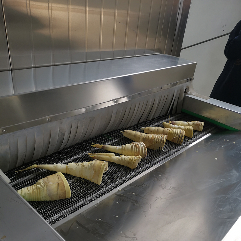 High-speed industrial vacuum bagger with rotary bag-feeding system and 304 stainless steel frame.