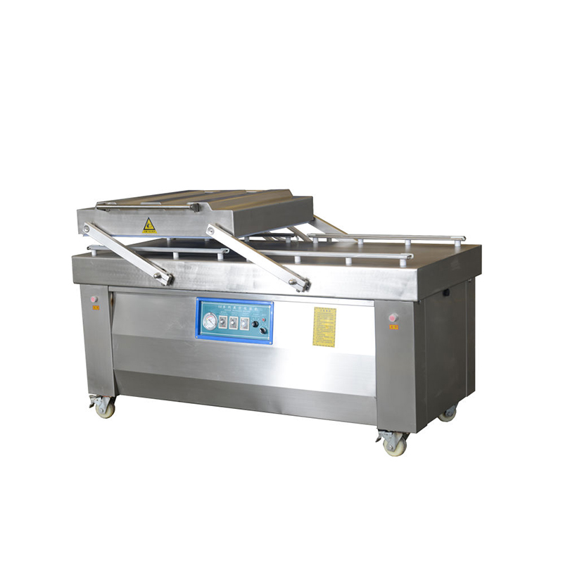 Commercial double chamber vacuum sealer machine for food and industrial product packaging.