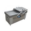 Large-capacity automatic vacuum packing machine with twin chambers for meat, seafood, grains, and industrial product sealing.