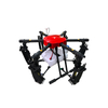 Smart agricultural spraying drone on the ground with 16L tank and carbon fiber structure, ready for field use.