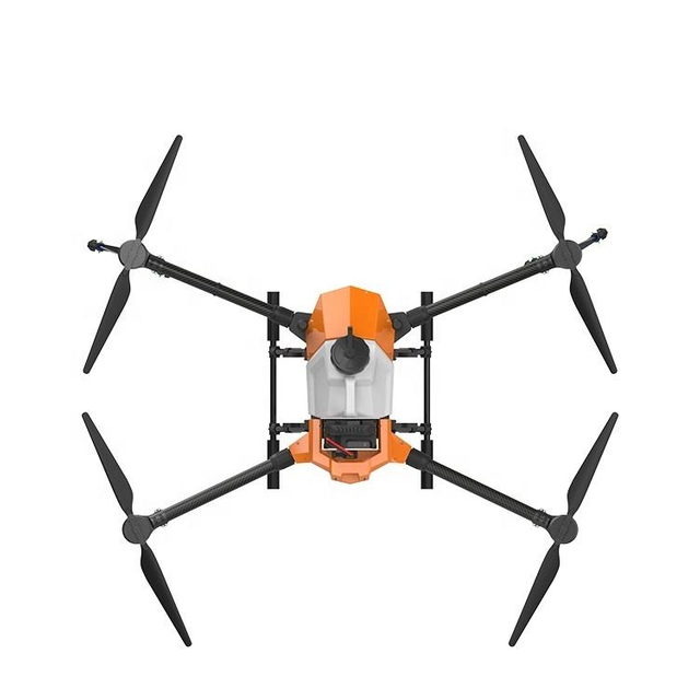 Agricultural UAV performing autonomous pesticide spraying over farmland with intelligent navigation system.