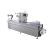 Continuous stretch vacuum packaging machine for high-speed thermoforming and automatic food sealing.