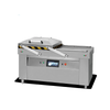 Double chamber commercial vacuum packing machine with stainless steel body and automatic operation for high-volume food packaging.