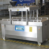 Commercial vacuum packing machine with full external dimensions and dual-chamber structure for high efficiency.