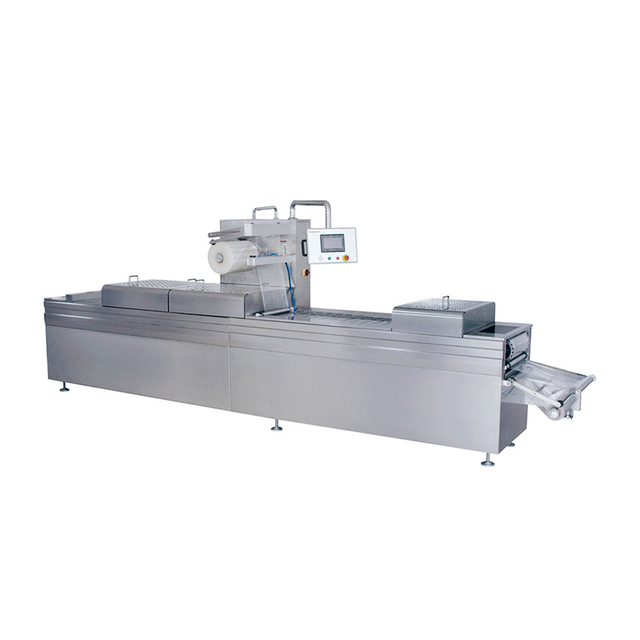 Continuous stretch vacuum packaging machine for high-speed thermoforming and automatic food sealing.