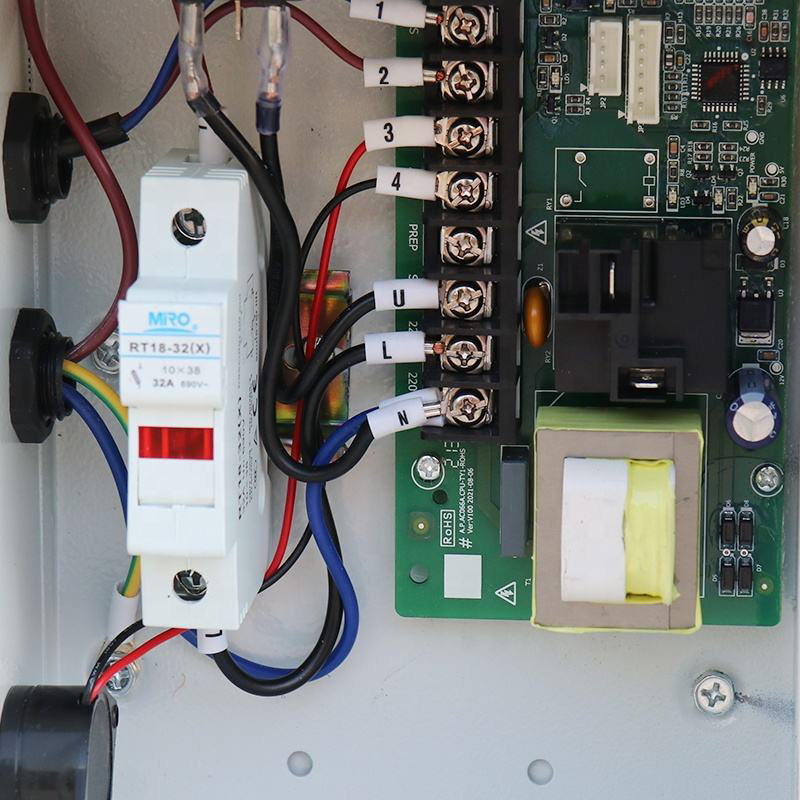 Compact vacuum material loader mounted on drying hopper