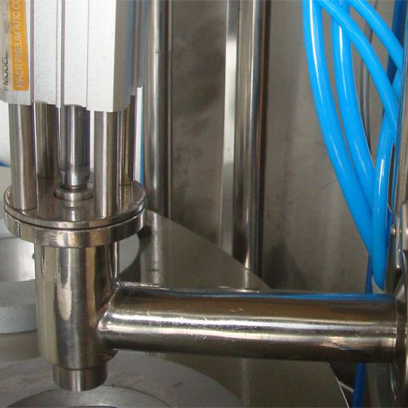 Compact rotary cup filling system for dairy, juice, jelly, and sauce packaging